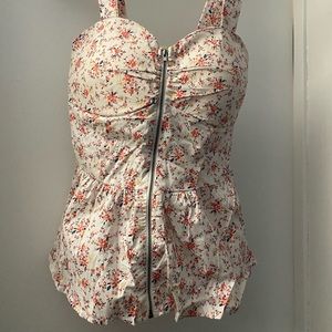 Front zip, crop top floral top.